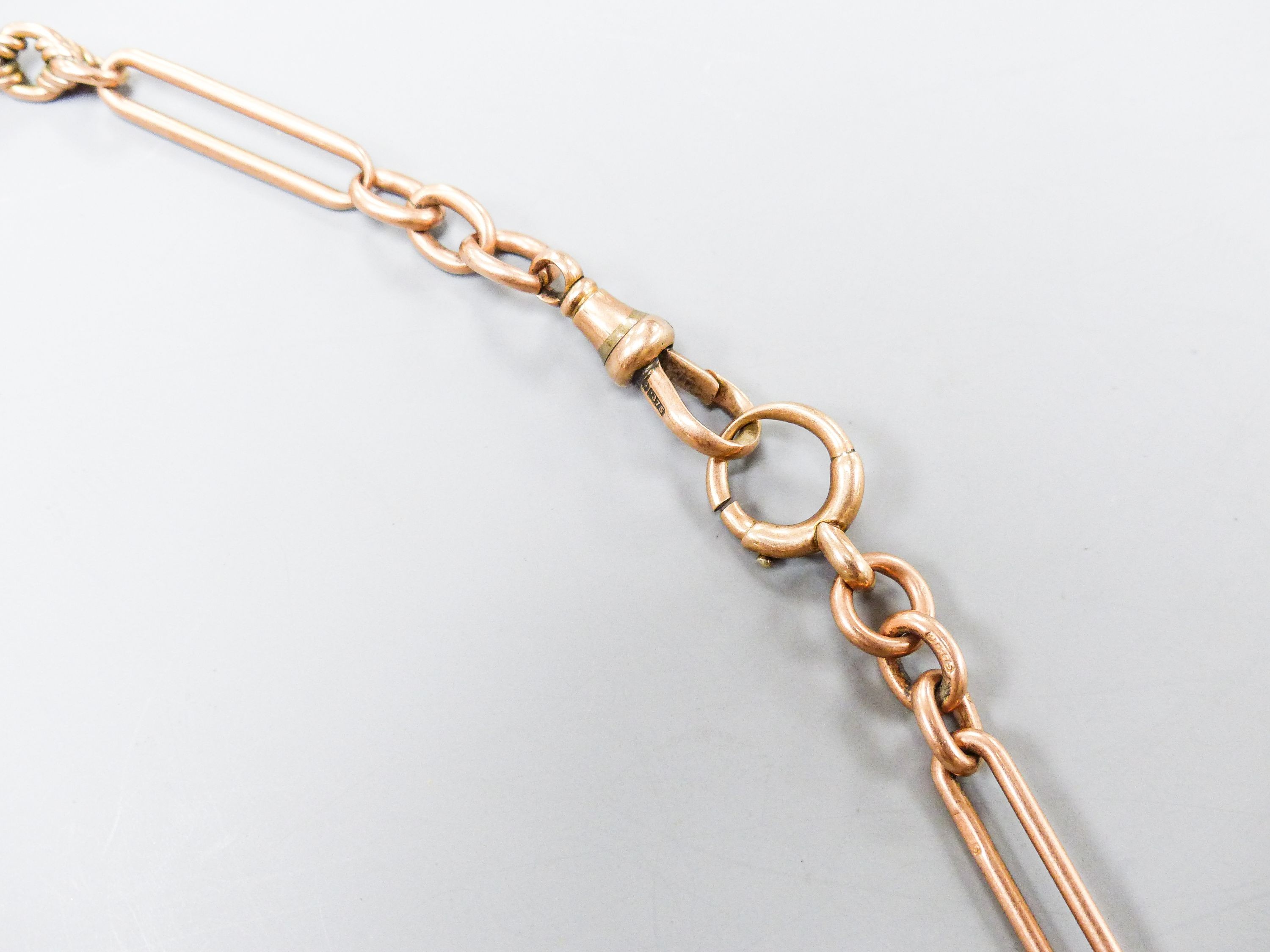 A 9ct rose gold albert, 47cm, 33 grams.